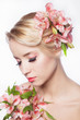 Pretty face of beautiful young woman with lily on hands - white Pretty face of beautiful young woman with lily on hands - white