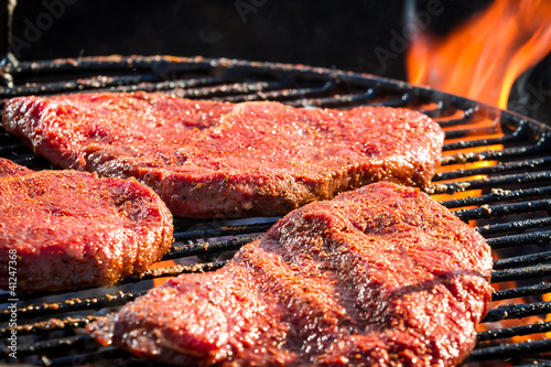 Photo: Steak on grill fire-toasted Steak on grill fire-toasted