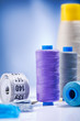 sewing threads and roll of tape