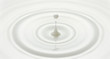 milk drop or white liquid drop created ripple