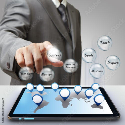 Photo: business man hand touch business success diagram glass icon business man hand touch business success diagram glass icon
