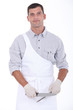 butcher sharpening his knife