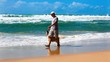 Male owner on a beach with a dog Male owner on a beach with a dog