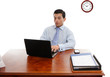 Foto: Executive at desk working Executive at desk working