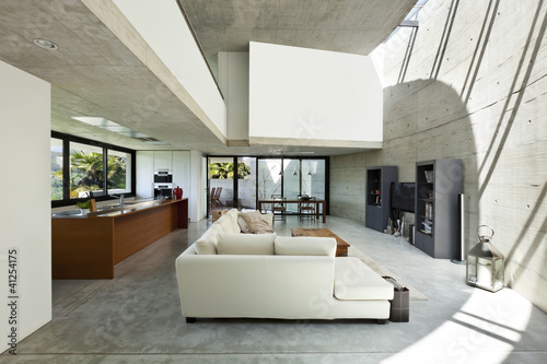 Photo: beautiful modern house in cement, interior, living room beautiful modern house in cement, interior, living room