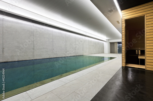 Photo: modern concrete house , indoor pool with sauna modern concrete house , indoor pool with sauna