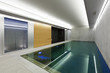 modern concrete house , indoor pool with sauna