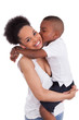 Photo: Litte black boy kissing her mother Litte black boy kissing her mother