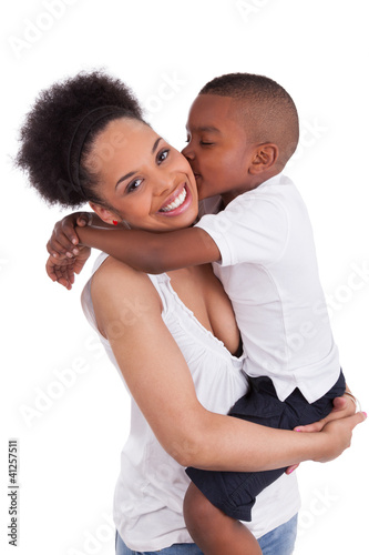 Photo: Litte black boy kissing her mother Litte black boy kissing her mother