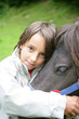 Little boy with horse