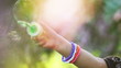 Happy girl playing with bubbles
