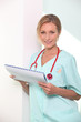 Female doctor holding patients results