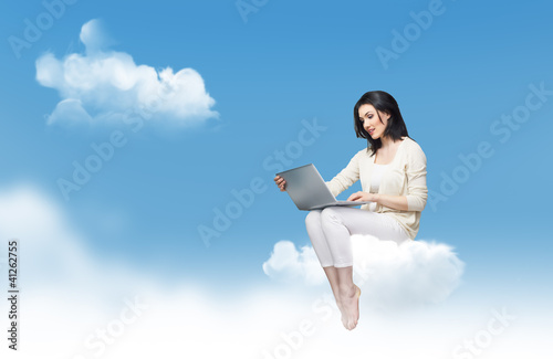 Photo: working in a laptop working in a laptop