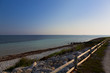 Sun lightinging up fence at Bahia Honda National Park Sun lightinging up fence at Bahia Honda National Park