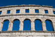 Pula coliseum against blue sky