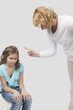 mother instructs her teenage daughter