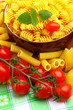 Delicious twig of tomatoes with several pasta types