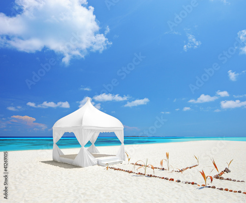 Photo: A view of a wedding tent on a beach in Maldives A view of a wedding tent on a beach in Maldives