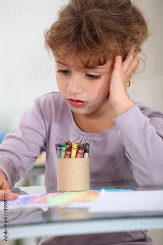 Photo: Girl with a pot of crayons Girl with a pot of crayons