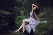 Cute woman in nature scenery
