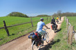 Cyclists in a countryside Cyclists in a countryside