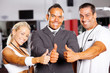 confident gym staff thumbs up