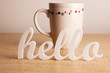 Photo: Hello in Front of Cup Hello in Front of Cup