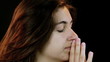 Closeup of girl praying