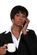 Serious businesswoman on the phone
