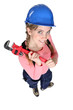 canvas print picture - Happy female worker holding wrench