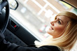 Beautiful businesswoman driving a car