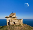 old broken lighthouse on a sea cape