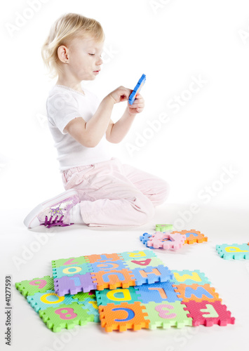 Foto: playing little girl playing little girl