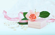 Pretty pink  roses, pearls, ribbon and lace.