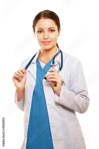 Photo: Friendly nurse with stethoscope isolated over white. Friendly nurse with stethoscope isolated over white.