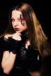 Photo: young woman with creative face-art young woman with creative face-art
