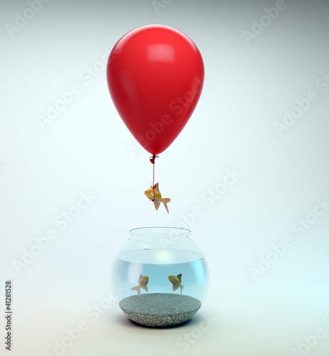 Photo: Gold fish flying away from a fishbowl Gold fish flying away from a fishbowl