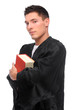 Photo: young judge (lawyer) with statute book young judge (lawyer) with statute book
