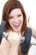 beautiful woman with dumbbell