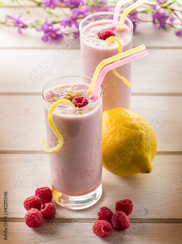 Photo: raspberry milkshake on glass with straw raspberry milkshake on glass with straw