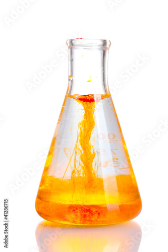Photo: brightly ink in a flask with water isolated on white brightly ink in a flask with water isolated on white