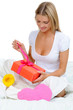 young woman with a gift box young woman with a gift box