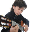 Photo: Little boy musician playing guitar Little boy musician playing guitar