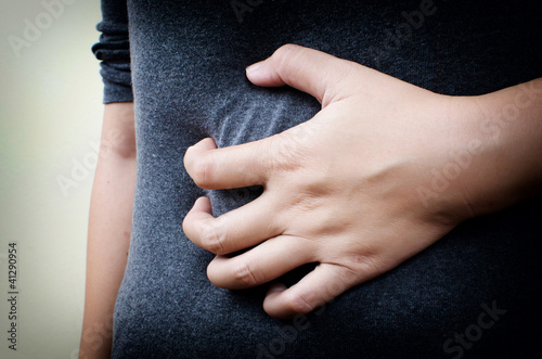 Photo: Woman Suffering From Abdominal Pain. Woman Suffering From Abdominal Pain.