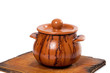 Dirty ceramic pot on old kitchen board Dirty ceramic pot on old kitchen board