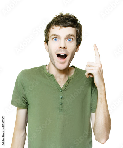 Photo: Excited Isolated Man Pointing To Blank Copyspace Excited Isolated Man Pointing To Blank Copyspace