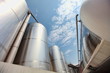 Silver silos and tank - industrial infrastructure