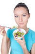 Woman eating vegetarian salad