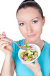 Portrait of woman eating vegetarian salad