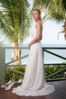 Beautiful bride on tropical sea side background